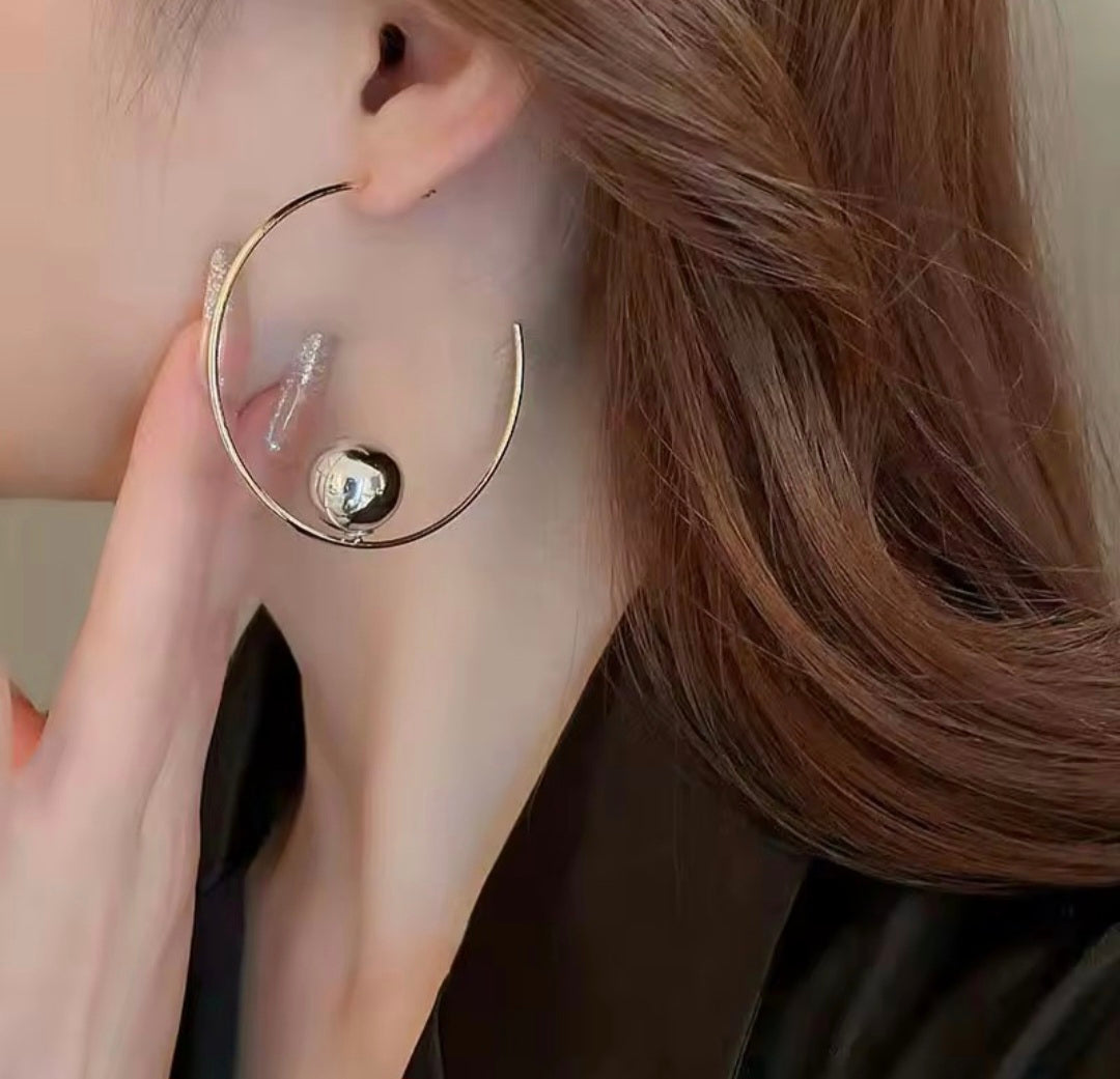 New Fashion Ball in a Hoop Earring.