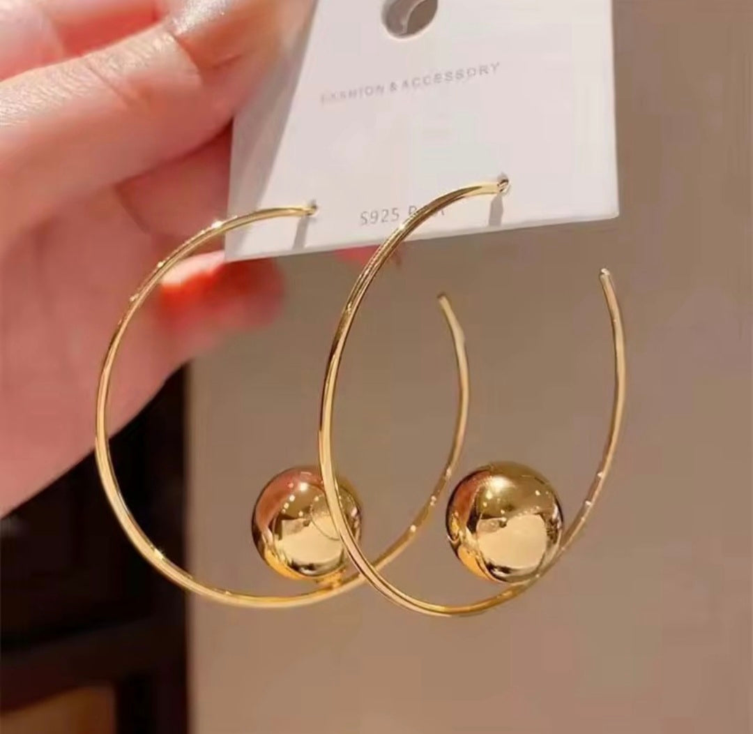 New Fashion Ball in a Hoop Earring.